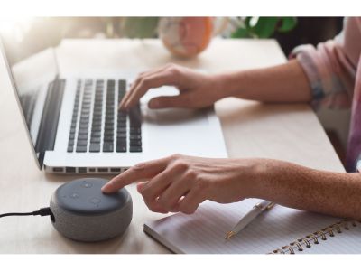 a lady on a computer trying to buy the same product cheaper on amazon